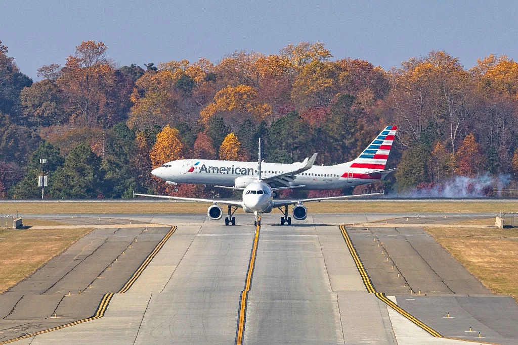 Passenger aircraft taxiing on an airport runway