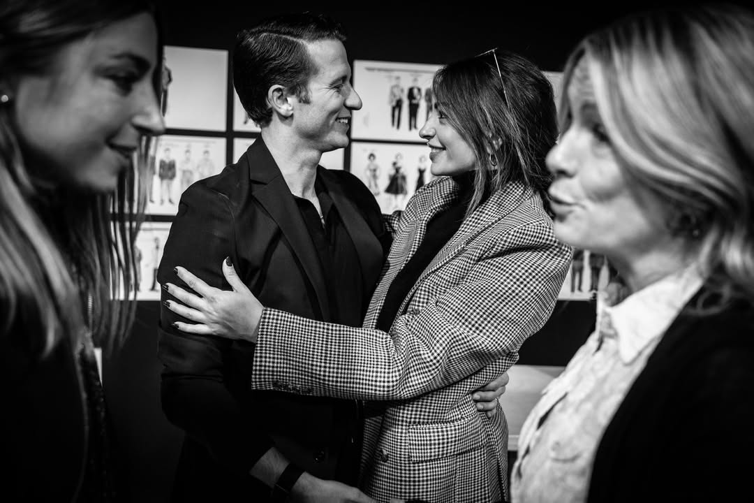 Sinatra the Musical cast members talk together backstage