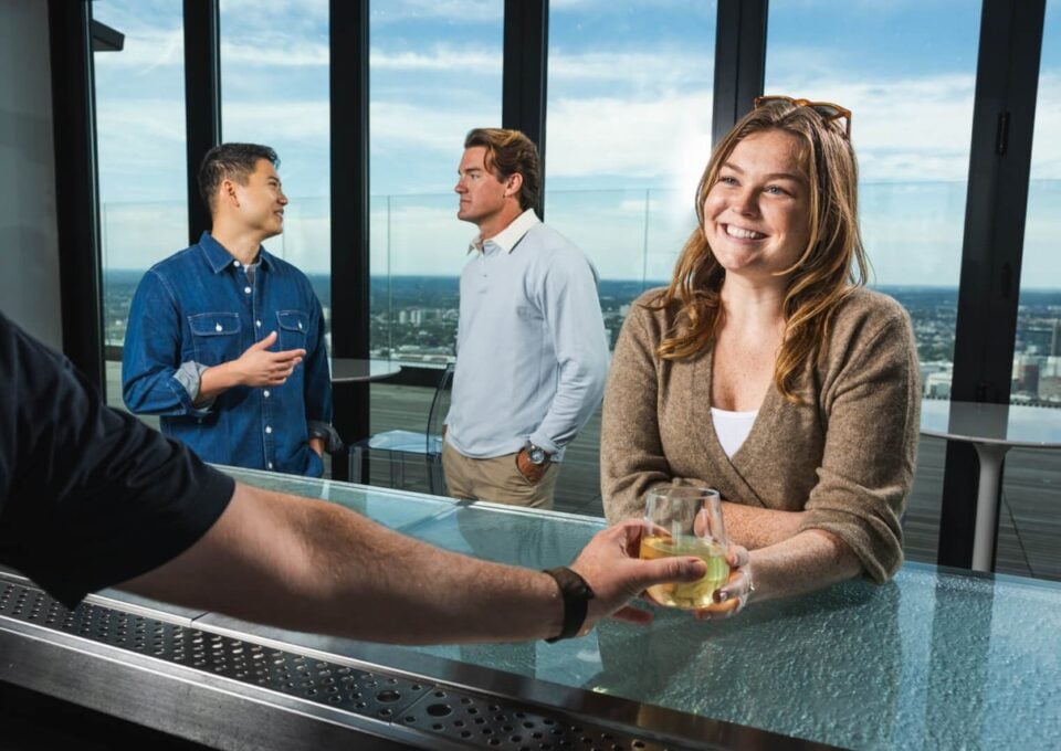 Visitors taking in Boston from the observation deck