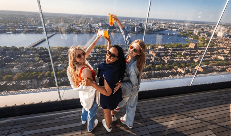 Visitors taking in the Boston skyline at View Boston